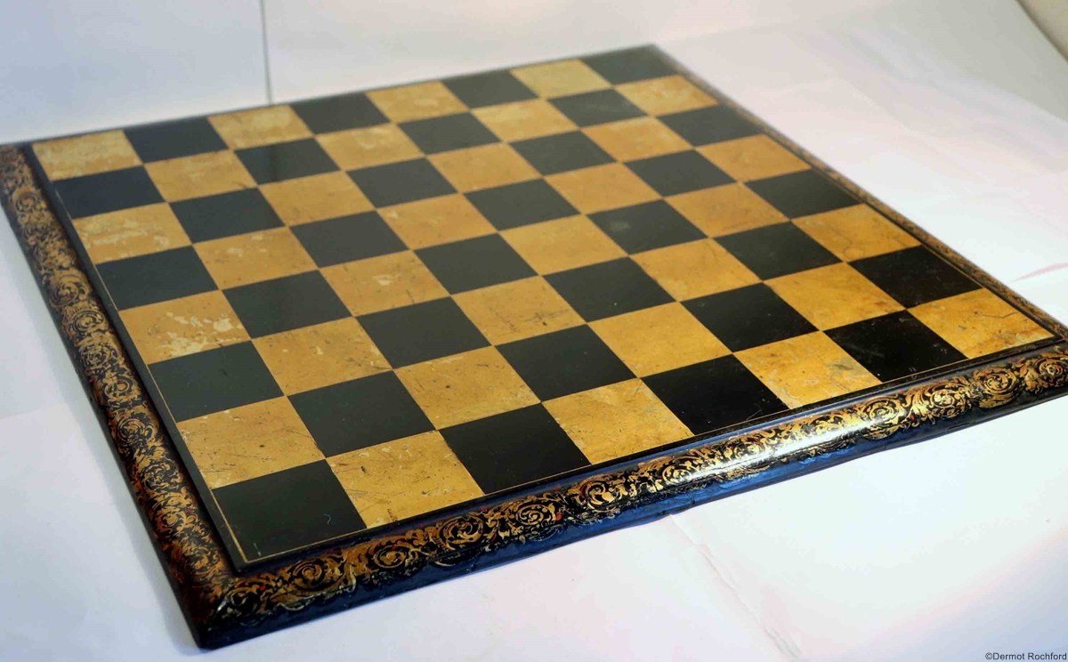 Antique lacquered chess board