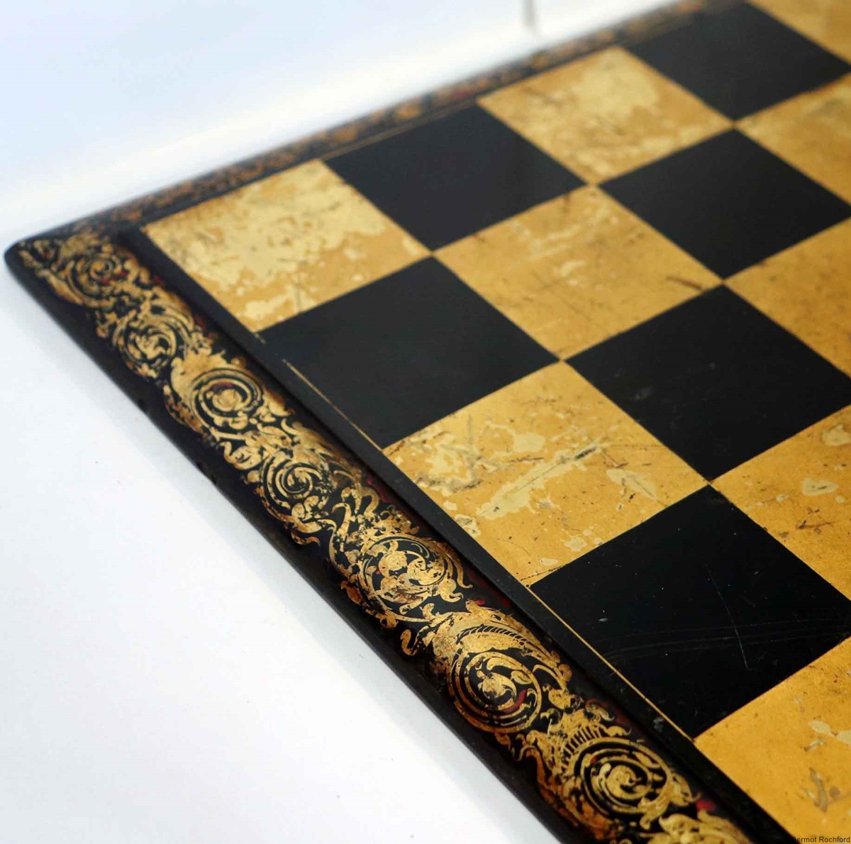 Antique lacquered chess board